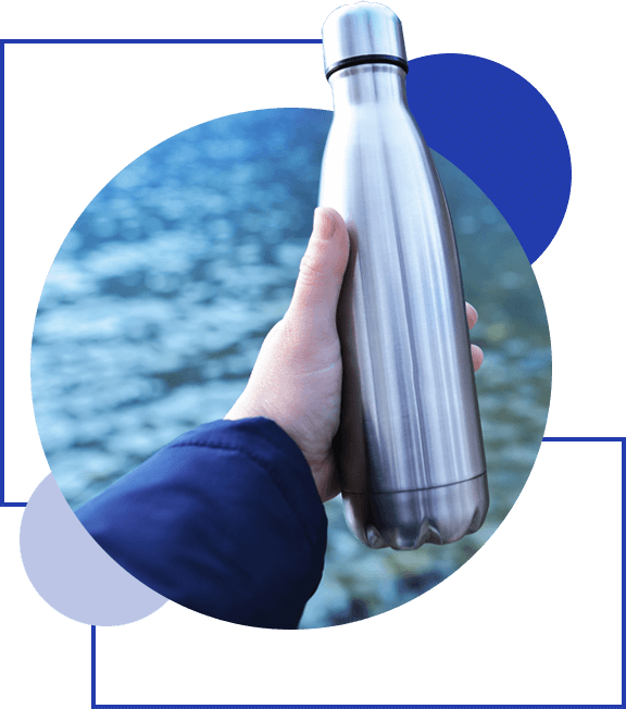 Close-up of male hand holding reusable, steel thermo shiny bottle for water.